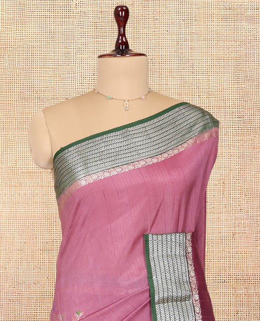 Pink Raw mango Silk Saree, Gracefully Embellished with Floral Embroidery Buttas, a Contrast Chevron Striped Border, Intricate Pallu, and a Contrast Blouse