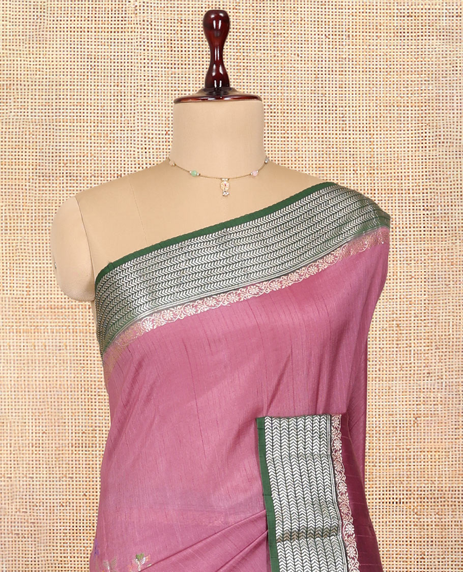 Pink Raw mango Silk Saree, Gracefully Embellished with Floral Embroidery Buttas, a Contrast Chevron Striped Border, Intricate Pallu, and a Contrast Blouse