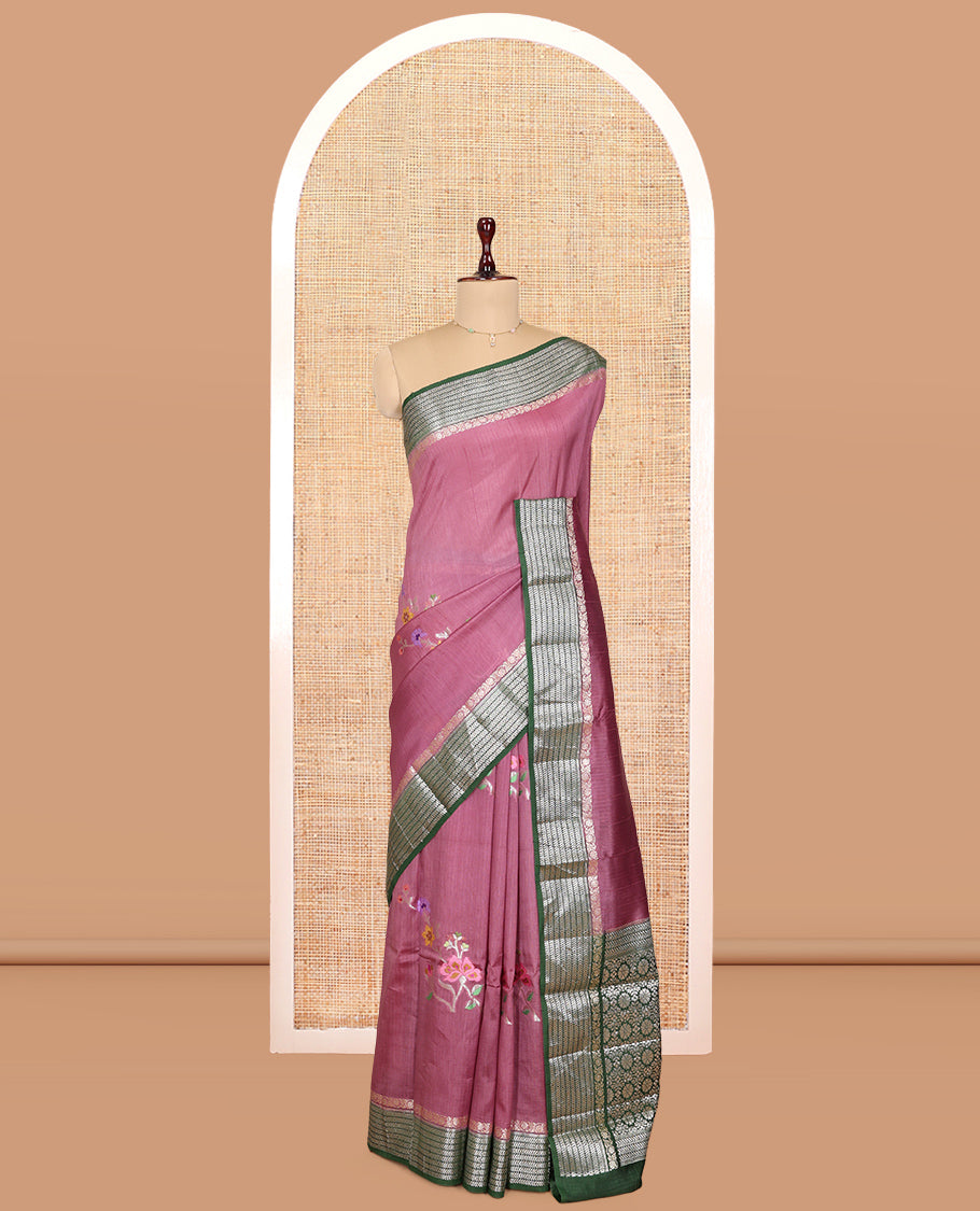 Pink Raw mango Silk Saree, Gracefully Embellished with Floral Embroidery Buttas, a Contrast Chevron Striped Border, Intricate Pallu, and a Contrast Blouse