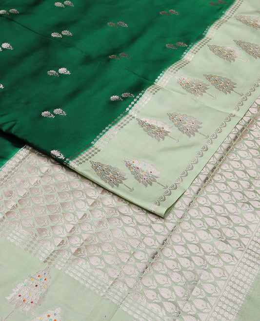 Dark green floral motifs raw mango silk saree with contrast zari design border & floral design pallu
