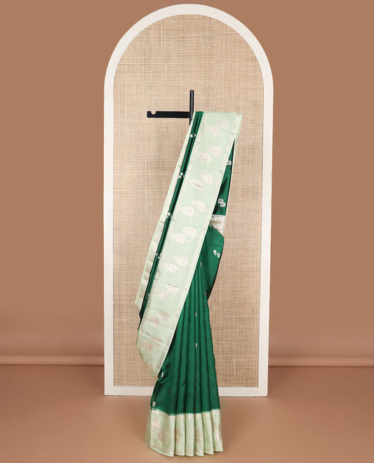 Dark green floral motifs raw mango silk saree with contrast zari design border & floral design pallu