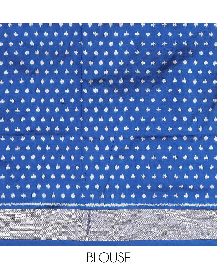 Blue Ikkat Silk Saree Colourfully Woven in Floral Buttas Across the Body, Featuring a Zari Border, a Pallu Adorned with Ikkat Weave, and Paired with a Matching Blouse