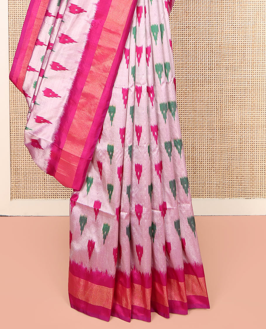 Grey Ikkat Silk Saree, Adorned with Temple Buttas All Over Its Body, Complemented by a Contrast Temple Border, Pallu of Butta Enclosed Jaal Designs, and Paired with a Contrast Blouse