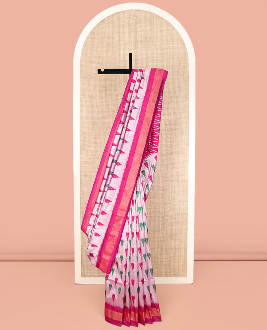 Grey Ikkat Silk Saree, Adorned with Temple Buttas All Over Its Body, Complemented by a Contrast Temple Border, Pallu of Butta Enclosed Jaal Designs, and Paired with a Contrast Blouse