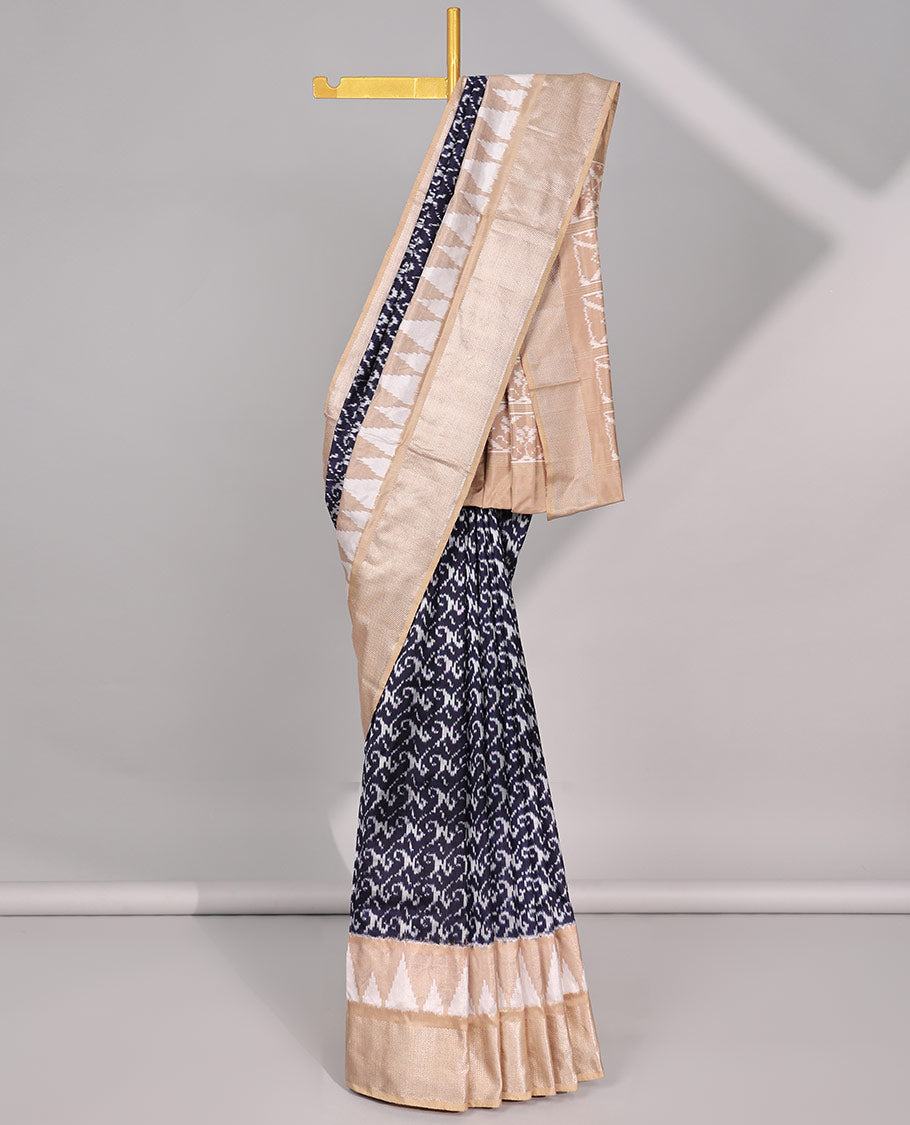 Blue intricate design ikkat saree with triangle motifs & geometric, floral motifs pallu