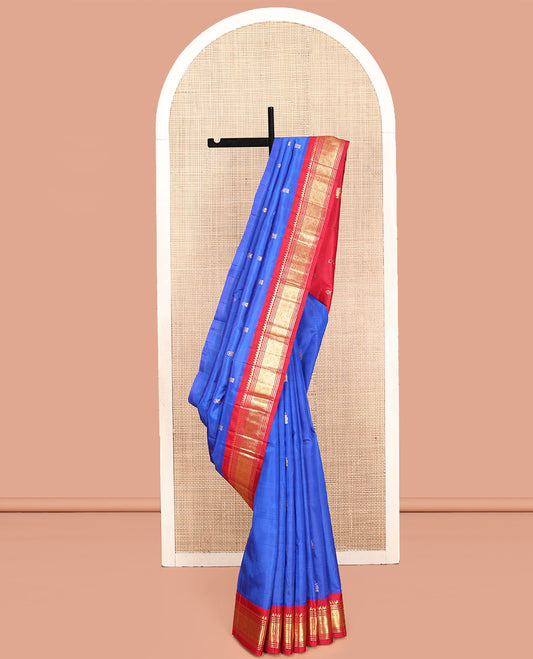 Royal Blue Kanchipuram Silk Saree, Adorned with Zari Buttas, Contrast Korvai One-Sided Border of Salngai, Banaras, Muthu, and Jaal, Zari Design Pallu, and No Blouse