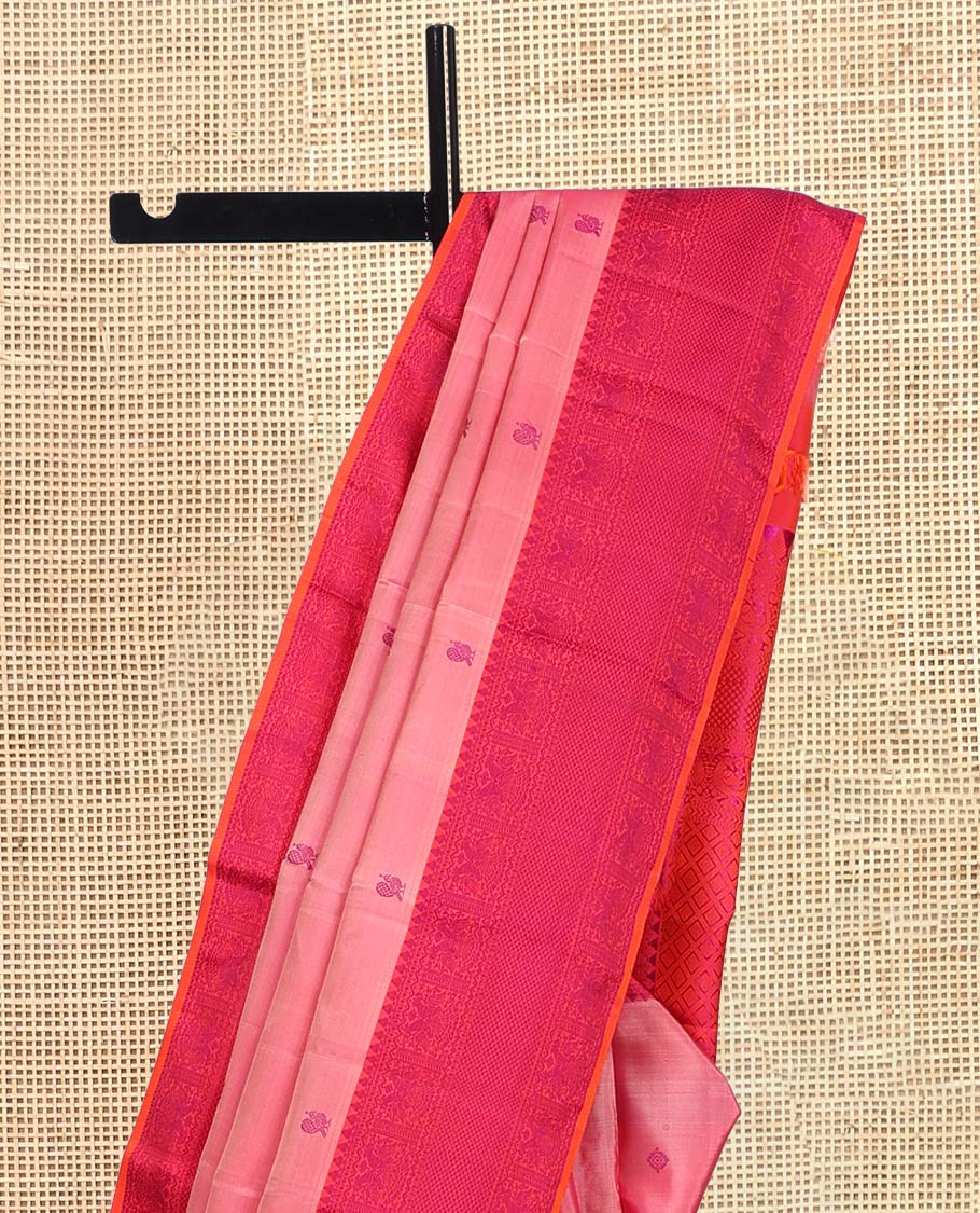 Pink Kanchipuram Silk Saree, Delicately Woven with Mayil-Chakram Buttas, a Contrast Border of Thilakam Mokku, Iruthalai Pakshi, and Kuyil Kann, Jaal Pallu, and a Contrast Blouse