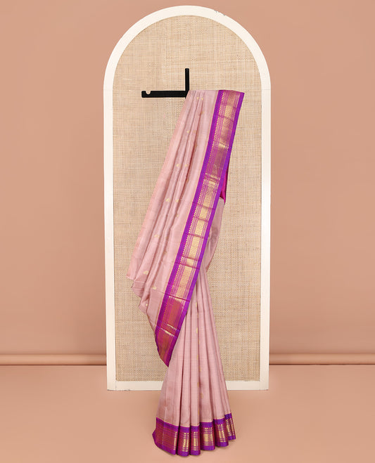 Pink Kanchipuram Silk Saree, Adorned with Zari Buttas on Its Body, Complemented by a Contrast One-Sided Korvai Border of Rekku, Banaras, Muthu, and Jaal Designs, Pallu Features Zari Designs, and Comes Without a Blouse