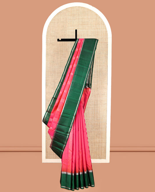 Pink Kanchipuram Silk Saree, Sparsely Woven with Buttas and Stripes, Complemented by a Contrast Bodi Border, Grand Pallu, and a Contrast Blouse