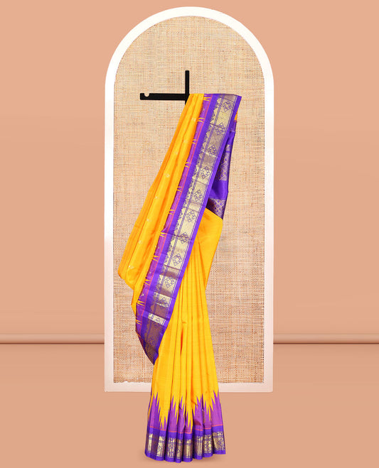 Yellow Kanchipuram Silk Saree, Adorned with Zari Buttas, Complemented by a Contrast One-Sided Thazampoo Rekku Traditional Zari Border, Grand Pallu, and No Blouse