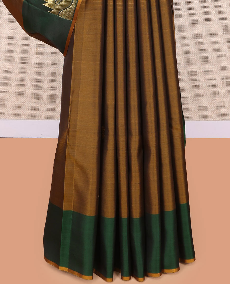 Brown Kanchipuram Silk Saree, Subtly Woven with Buttas, Complemented by a Contrast Thazampoo Rekku Border, Grand Floral Pallu, and Contrast Blouse
