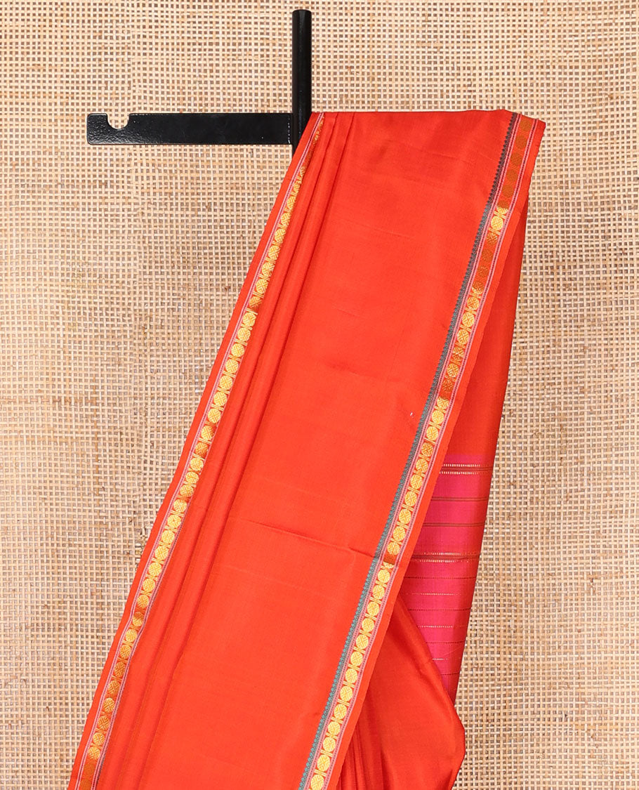 Red kancheepuram silk saree with self border of thilakam mokku, paun design & striped pallu