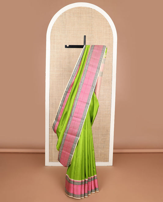 light green kancheepuram silk saree with contrast border of thilakam mokku, banaras, poo chakram design & zari design pallu