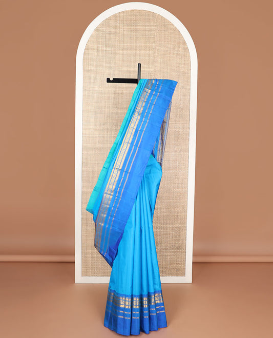 Blue kancheepuram silk saree with contrast ganga jamuna border of rekku, muthu, kuyil kann design & striped pallu