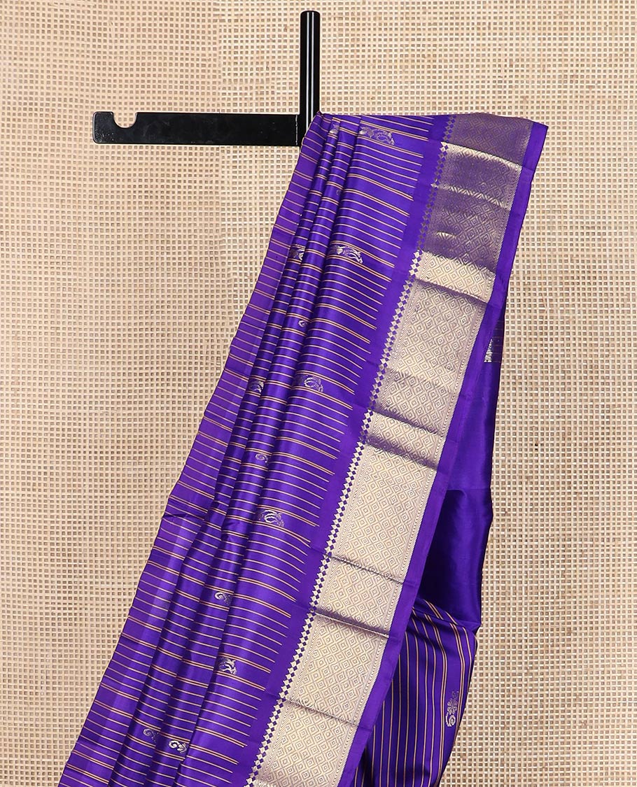 Blue stripes & buttas Kanchipuram silk saree, one-sided border of panner sombu,banaras & mayil kann & zari design pallu
