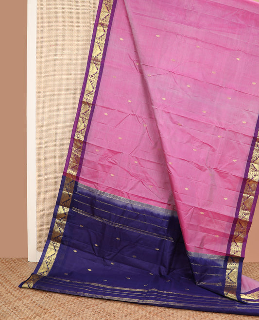 Pink zari buttas Kanchipuram silk saree, contrast border of thilakam mokku, poun, thazampoo rekku, and neli designs, and zari design pallu