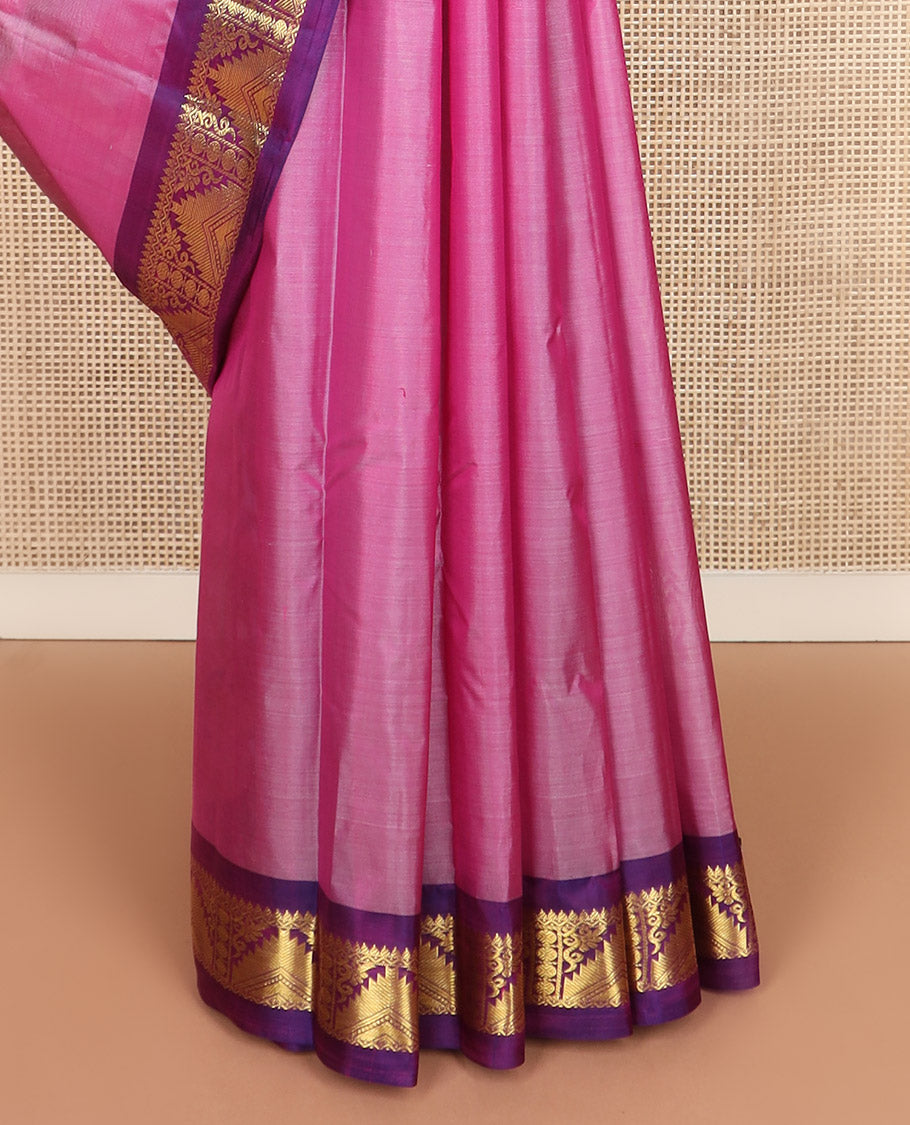 Pink zari buttas Kanchipuram silk saree, contrast border of thilakam mokku, poun, thazampoo rekku, and neli designs, and zari design pallu