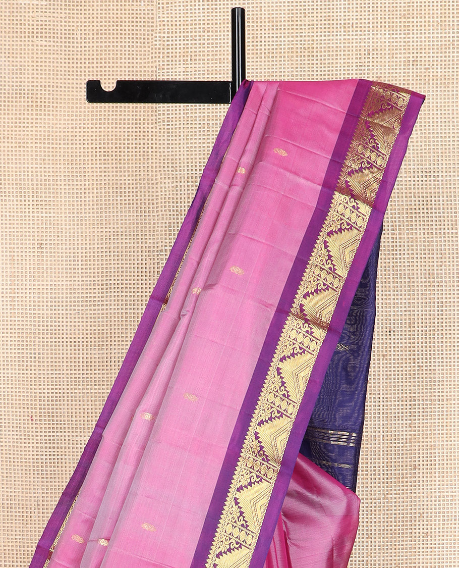 Pink zari buttas Kanchipuram silk saree, contrast border of thilakam mokku, poun, thazampoo rekku, and neli designs, and zari design pallu