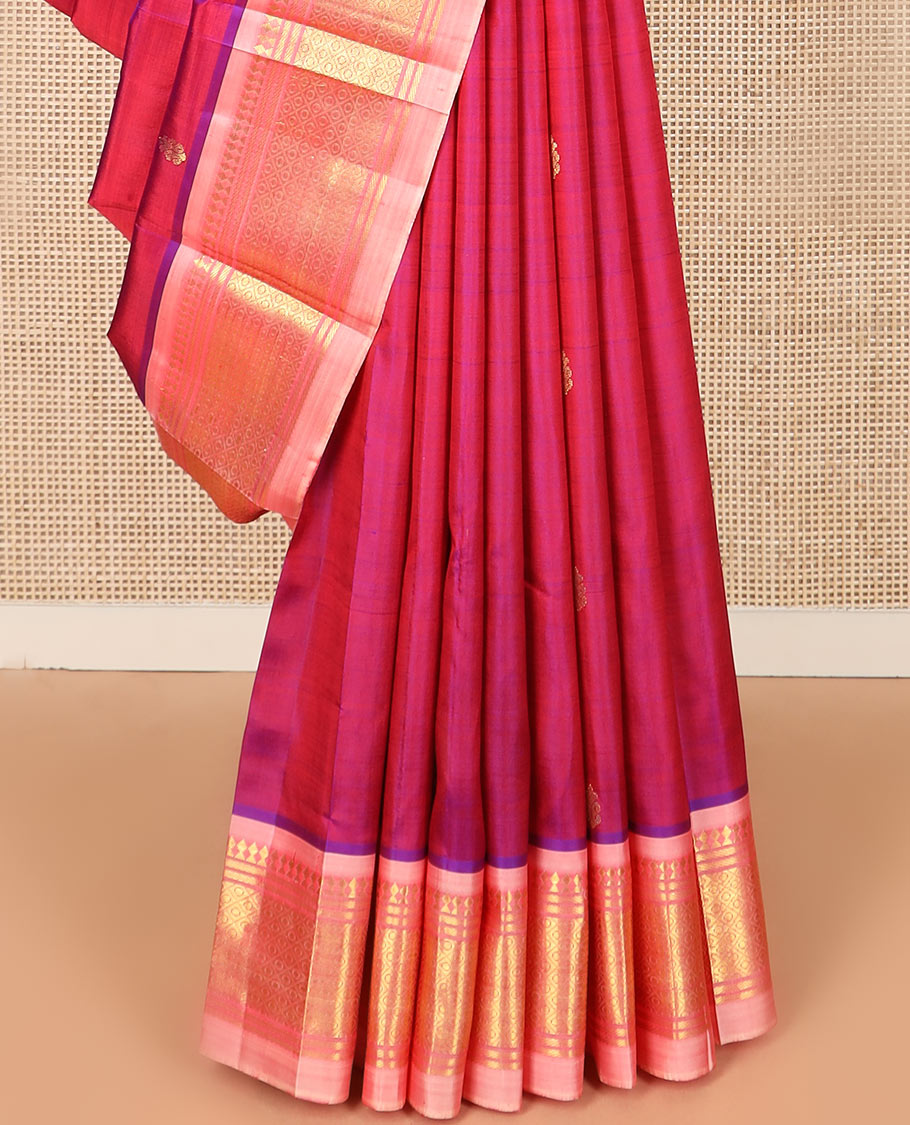 Magenta zari buttas Kanchipuram silk saree, contrast border of paneer sombu, banaras, and mayil kann designs, and zari design pallu