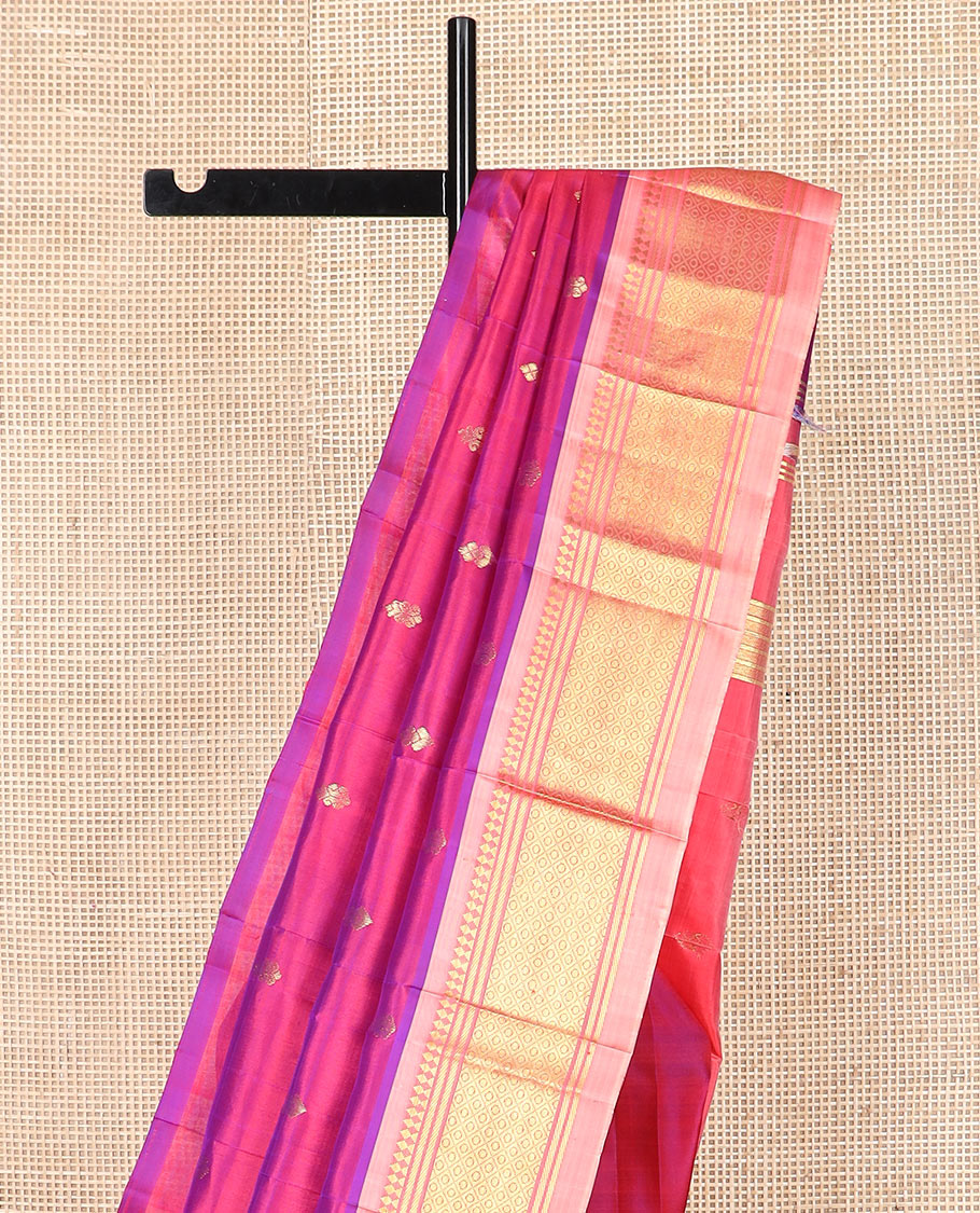 Magenta zari buttas Kanchipuram silk saree, contrast border of paneer sombu, banaras, and mayil kann designs, and zari design pallu