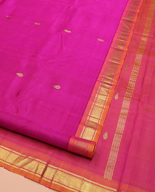 Rani Pink Kanchipuram Silk Saree Embellished with Zari Buttas All Over Its Body, Complemented by Contrast One-Sided Border of Banaras, and Mayil Kann Designs, Pallu Bedecked with Zari Designs, and Comes Without a Blouse