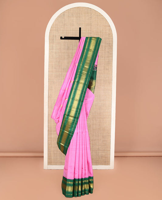 Pink Kanchipuram Silk Saree, Adorned with Manga and Mayil Buttas, Complemented by Contrast One-Sided Korvai Border of Thilakam Mokku, Banaras, and Kuyil Kann Designs, Pallu Steeped with Mayil Designs, and Comes Without a Blouse