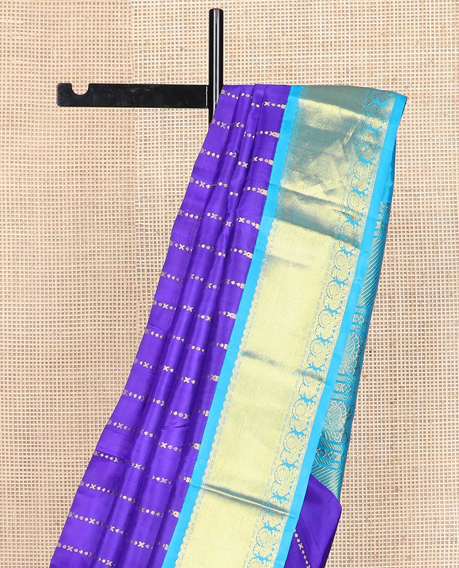 Violet zari design Kanchipuram silksaree, contrast one-sided korvai border & pallu of salngai, lavangam & mayil designs