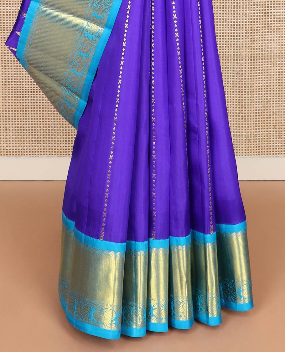 Violet zari design Kanchipuram silksaree, contrast one-sided korvai border & pallu of salngai, lavangam & mayil designs
