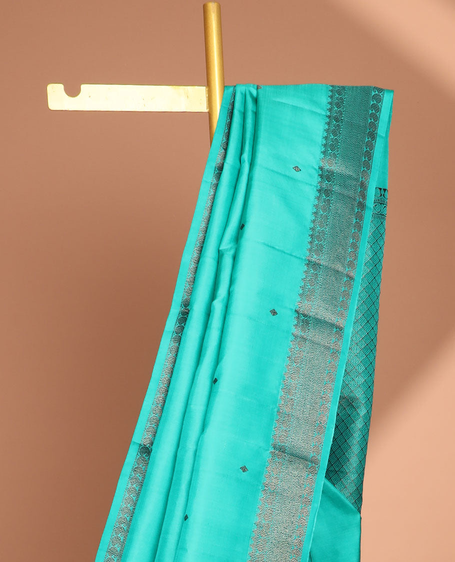 Blue buttas kancheepuram silk saree with self border of rekku,muthu,mayil, paisley design & intricate zari design pallu