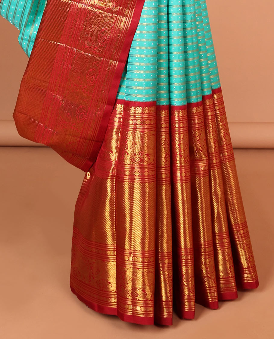 Light Blue striped floral design kanchipuram silk saree with contrast korvai border of manga, banaras, muthu, paun, yaanai design & zari design pallu