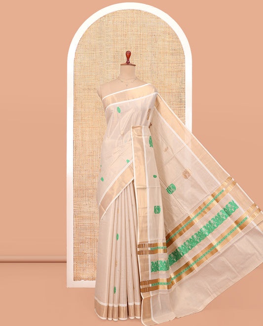 Cream Kerala Cotton Saree, Adorned with Thread and Zari Buttas All Over Its Body, a Zari Bavanji Border, an Intricate Pallu, and Paired with a Matching Blouse