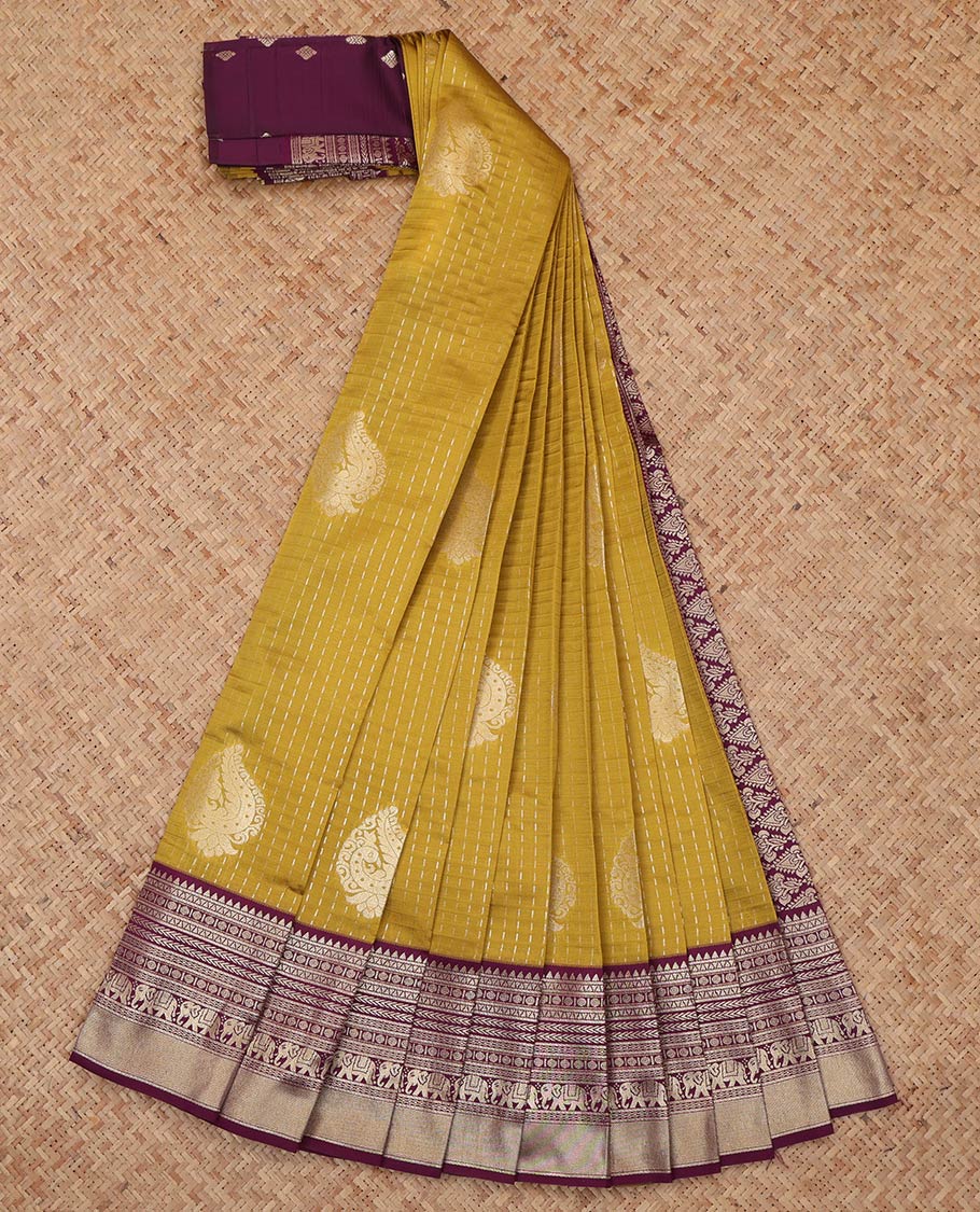 Mustard Litchi Saree, Gleamed Up with Zari Buttas and Checks, a Contrast Traditional Zari Border, Grand Pallu, and a Contrast Blouse
