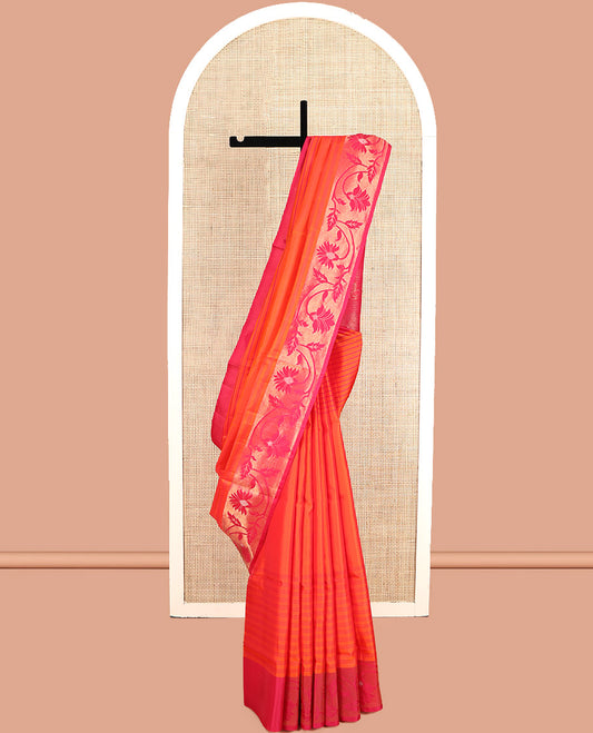Orange Mayuri Soft Silk Saree, Subtly Sparkled with Stripes, Complemented by a Contrast Floral Creeper Border, a Pallu of Floral Designs, and a Contrast Blouse