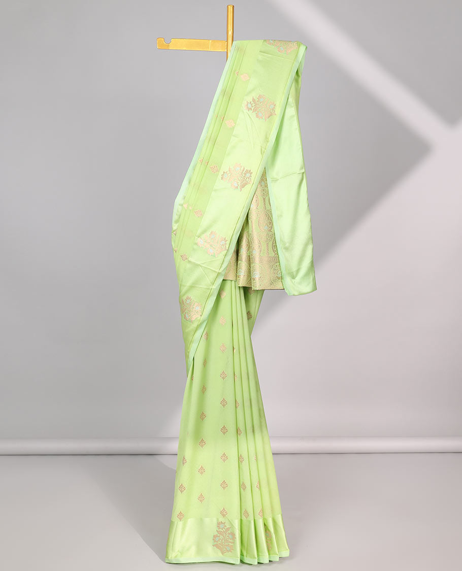 Green leaf motifs mushru silk saree with self floral design border & pallu of intricate zari design