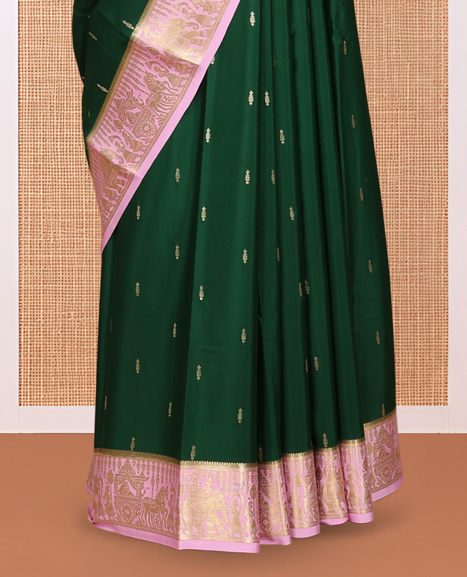 Green Mysore Silk Saree, Gleamed Up with Coin Zari Buttas, Complemented by a Contrast Traditional Zari Wedding Themed Border, a Rich Pallu, and Contrast Blouse