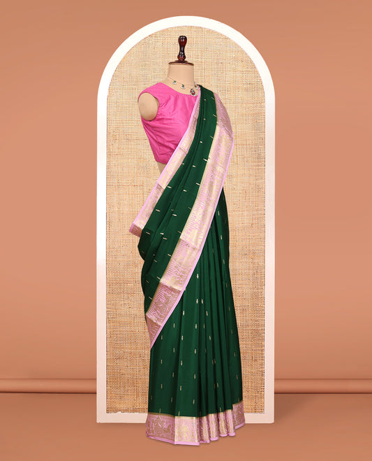 Green Mysore Silk Saree, Gleamed Up with Coin Zari Buttas, Complemented by a Contrast Traditional Zari Wedding Themed Border, a Rich Pallu, and Contrast Blouse