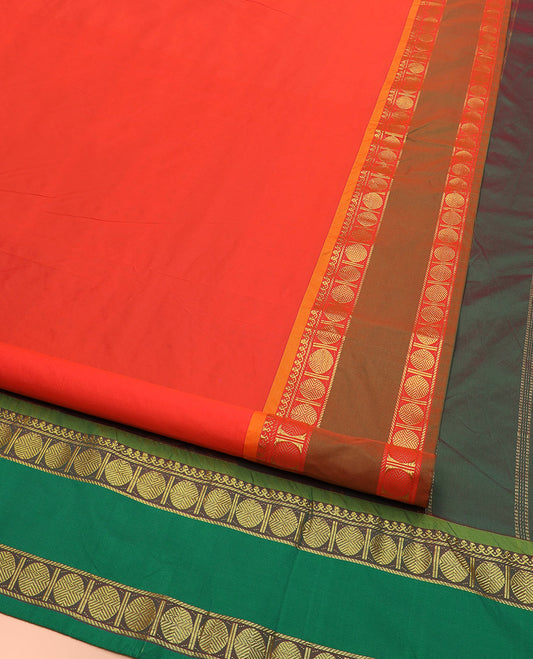 Orange Plain Ten Yard Art Silk Saree, Complemented by a Contrast Rettai Pettu Traditional Border of Rudraksham Motifs, and Pallu Mirrors the Same Border Designs