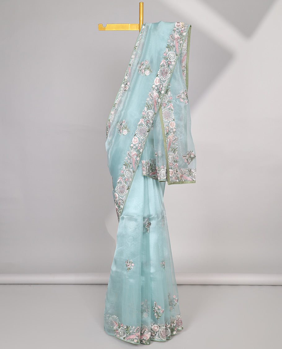 Blue floral motifs embroidered semi-banaras organza saree & floral embroidered border