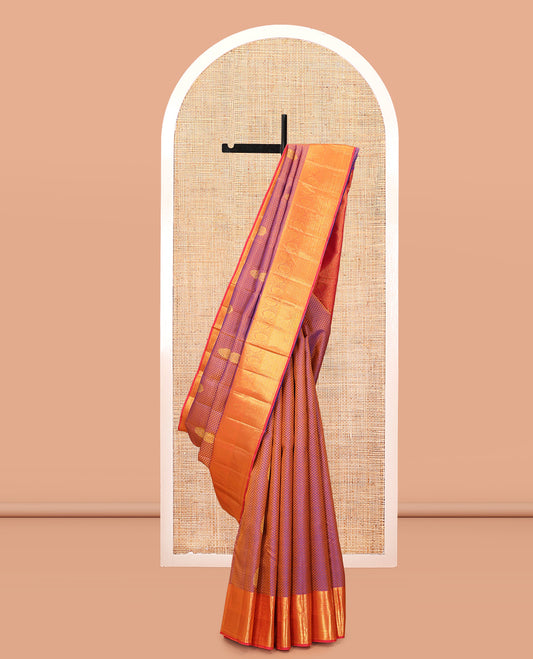 Violet Parampara Silk Saree, Adorned with Embossed and Zari Buttas, Contrast Border of Thilakam Mokku, Paisa, Kodi Visiry, and Vanki Designs, Grand Pallu, and a Contrast Blouse