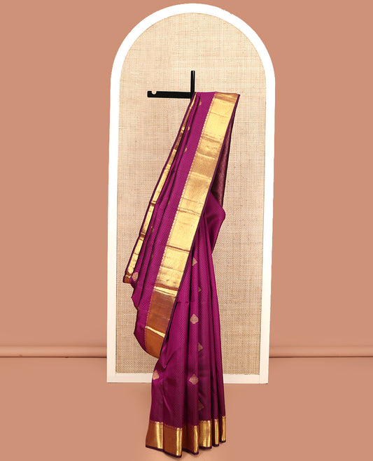 Wine Parampara Silk Saree, Enriched with Zari Buttas and Embossed Texture On Its Body, Highlighted by Zari Border of Thazampoo Rekku, Muthu, and Vanki Designs, Pallu Features Vanki Designs and Paired with a Matching Blouse
