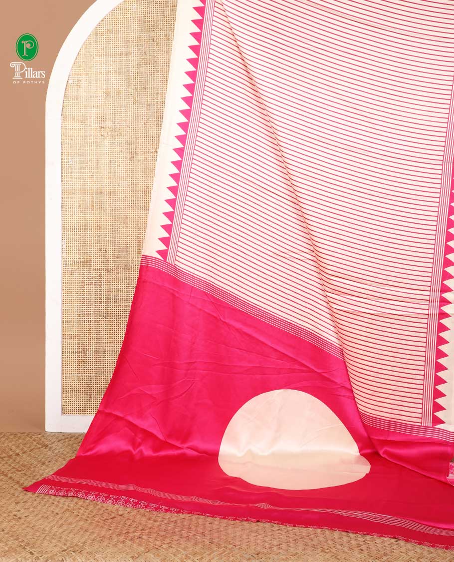 Cream with rani pink vertical lining design modal satin saree with remple printed border & big circle design pallu along with printed blouse