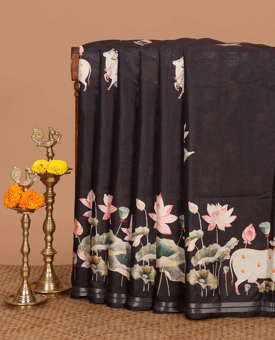 Black pichwai print muslin cotton saree with zari piping border & pichwai printed pallu along with lotus flower printed blouse