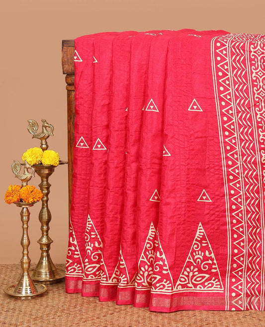 Rani pink batik-style triangle motifs printed dola silk saree, batik temple motif printed piping zari border & batik geometric printed pallu