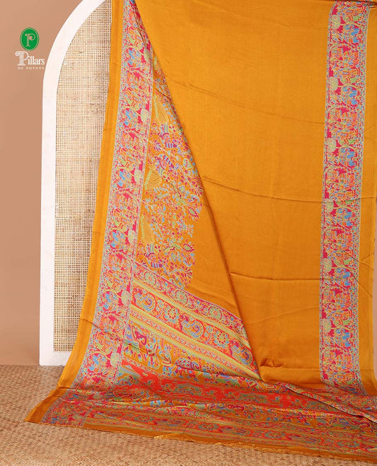 Mustard plain gajji silk saree, double-sided position printed border & pallu of animal & human motifs, with floral printed blouse