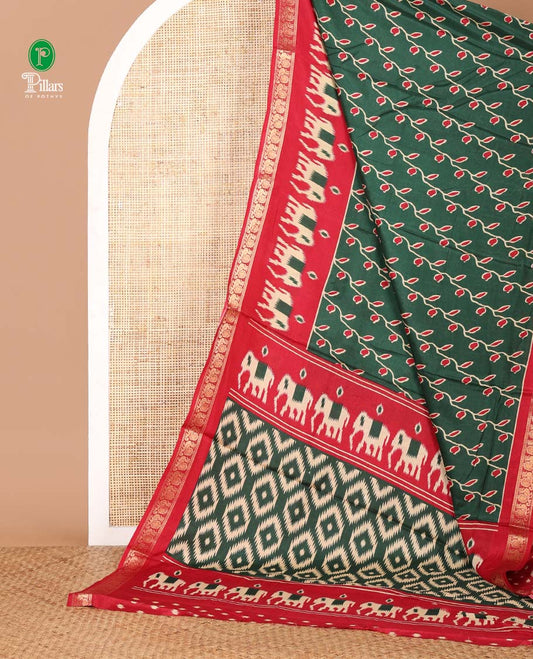 Green floral vine printed Assam cotton saree,contrast border of ikat elephant print & zari peacocks,ikat jaal pallu & ikat print blouse
