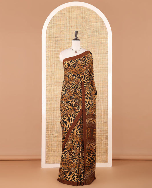 Brown leopard-skin-like printed crepe silk saree, plain piping border, geometric motif printed pallu & animal-skin print blouse
