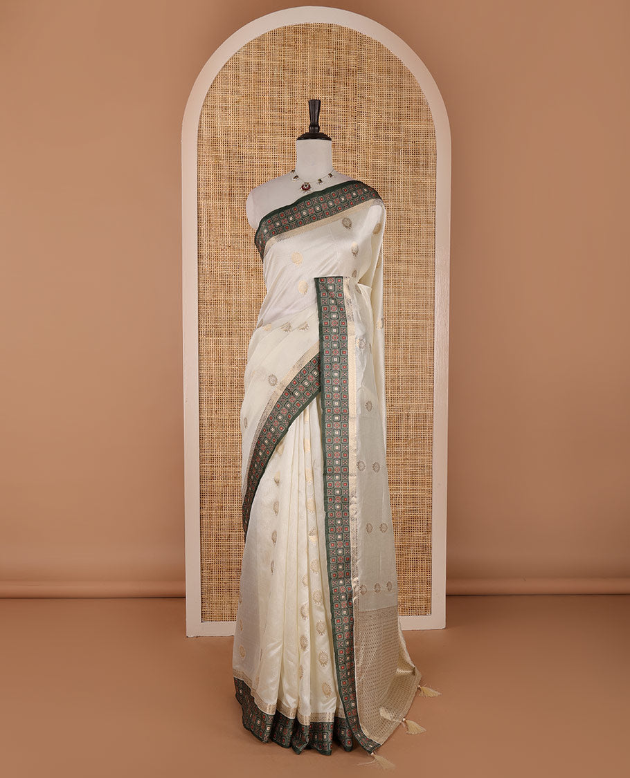 Cream gold zari buttas semi-organza saree, contrast zari & Ajrakh printed green border, zari weaving pallu & Ajrakh printed blouse