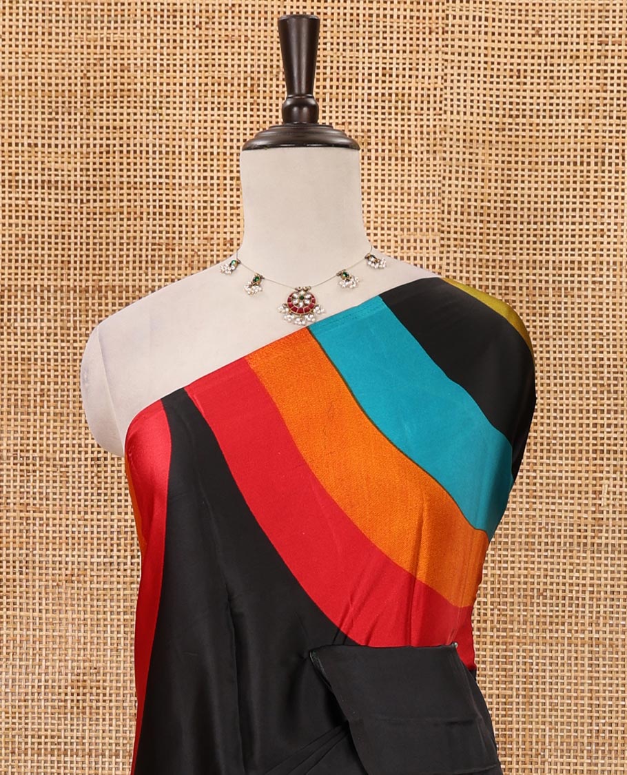 Borderless black-base kaleidoscopic-colored abstract printed satin crepe saree, rainbow-style printed pallu & matching plain blouse