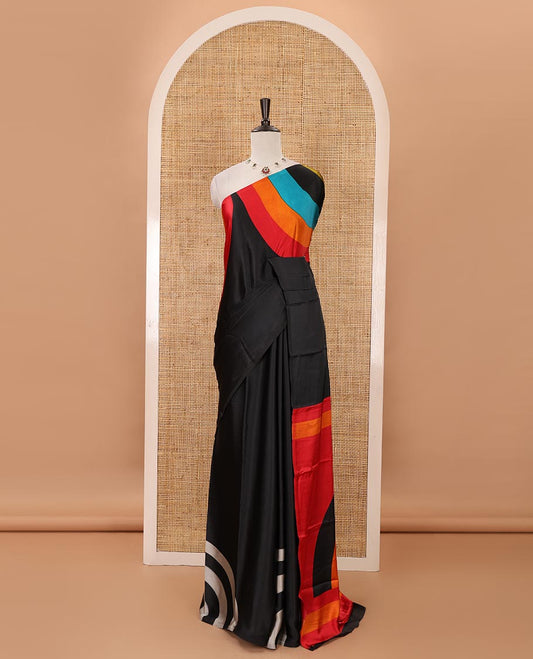 Borderless black-base kaleidoscopic-colored abstract printed satin crepe saree, rainbow-style printed pallu & matching plain blouse