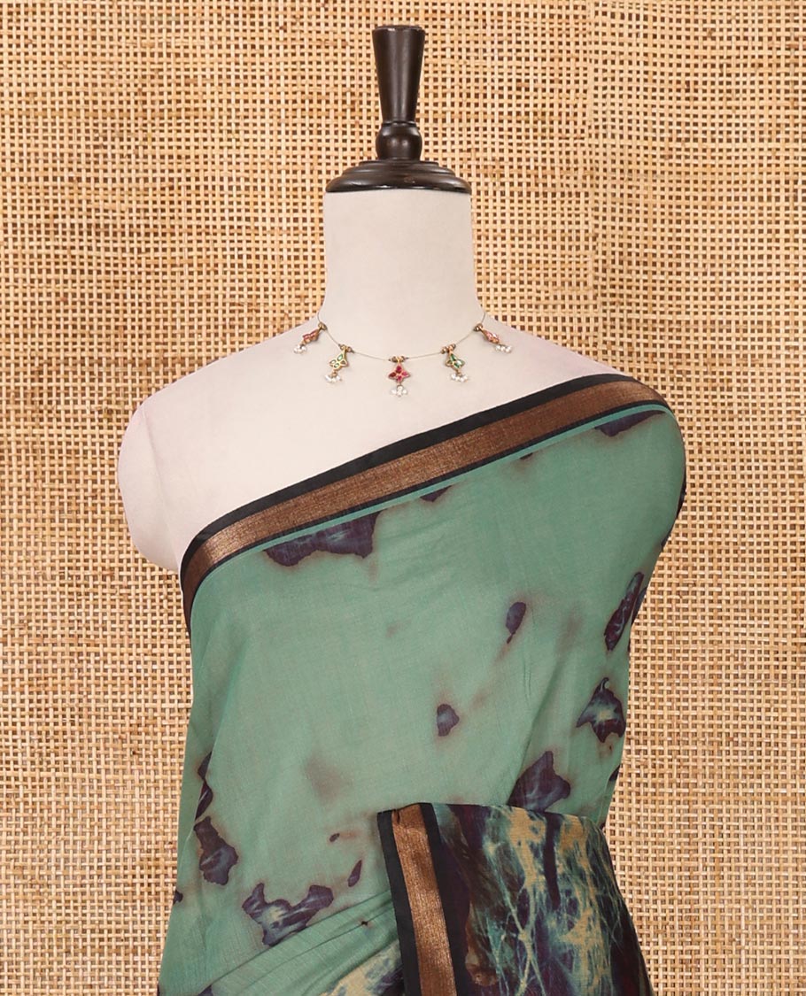 Sea blue shibori-style printed muslin saree, contrast zari piping border, self printed pallu & shibori-style printed blouse